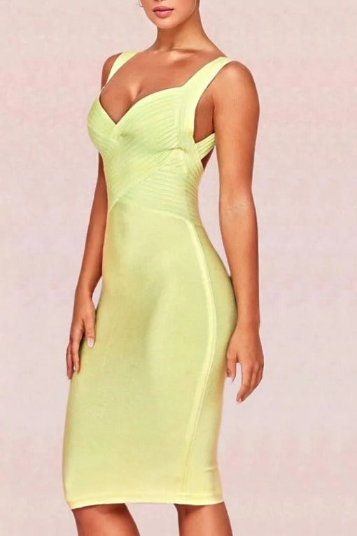 Woman wearing a figure flattering  Kyla Bandage Dress - Sun Yellow BODYCON COLLECTION